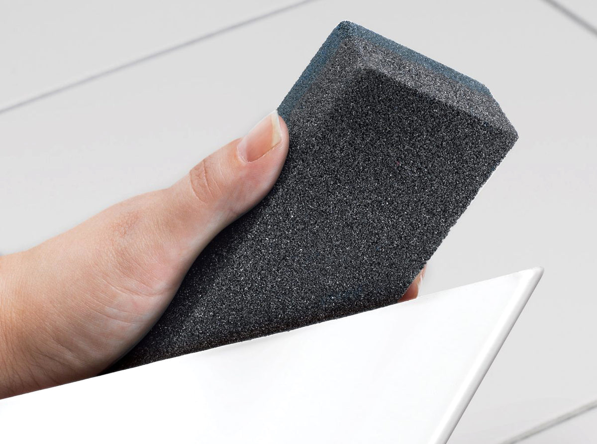 Smoothing cut tile edges