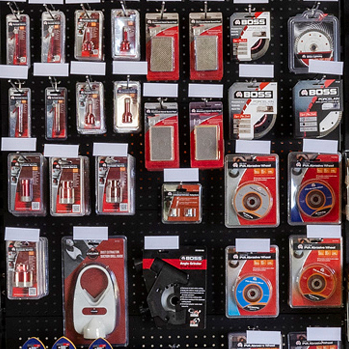 Tile cutting tools and accessories including diamond drill bits, angle grinder blades and polishing pads for tile installation.