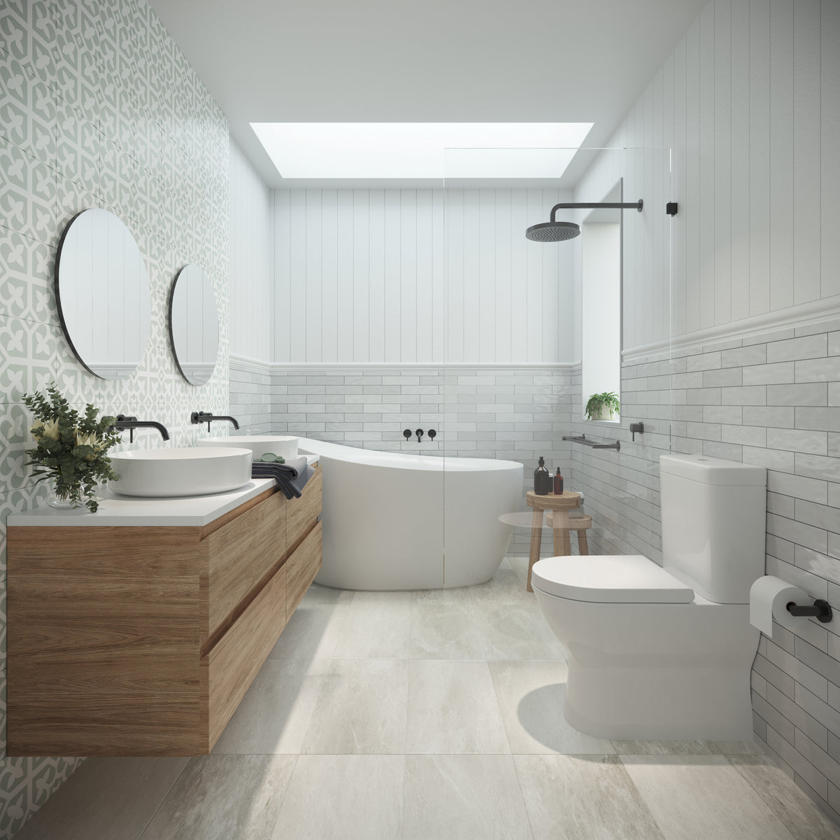 Contemporary bathroom featuring a decorative sage-green patterned feature wall, floating timber vanity, dual round mirrors, stone-look floor tiles and a freestanding bath positioned beside a frameless walk-in shower.