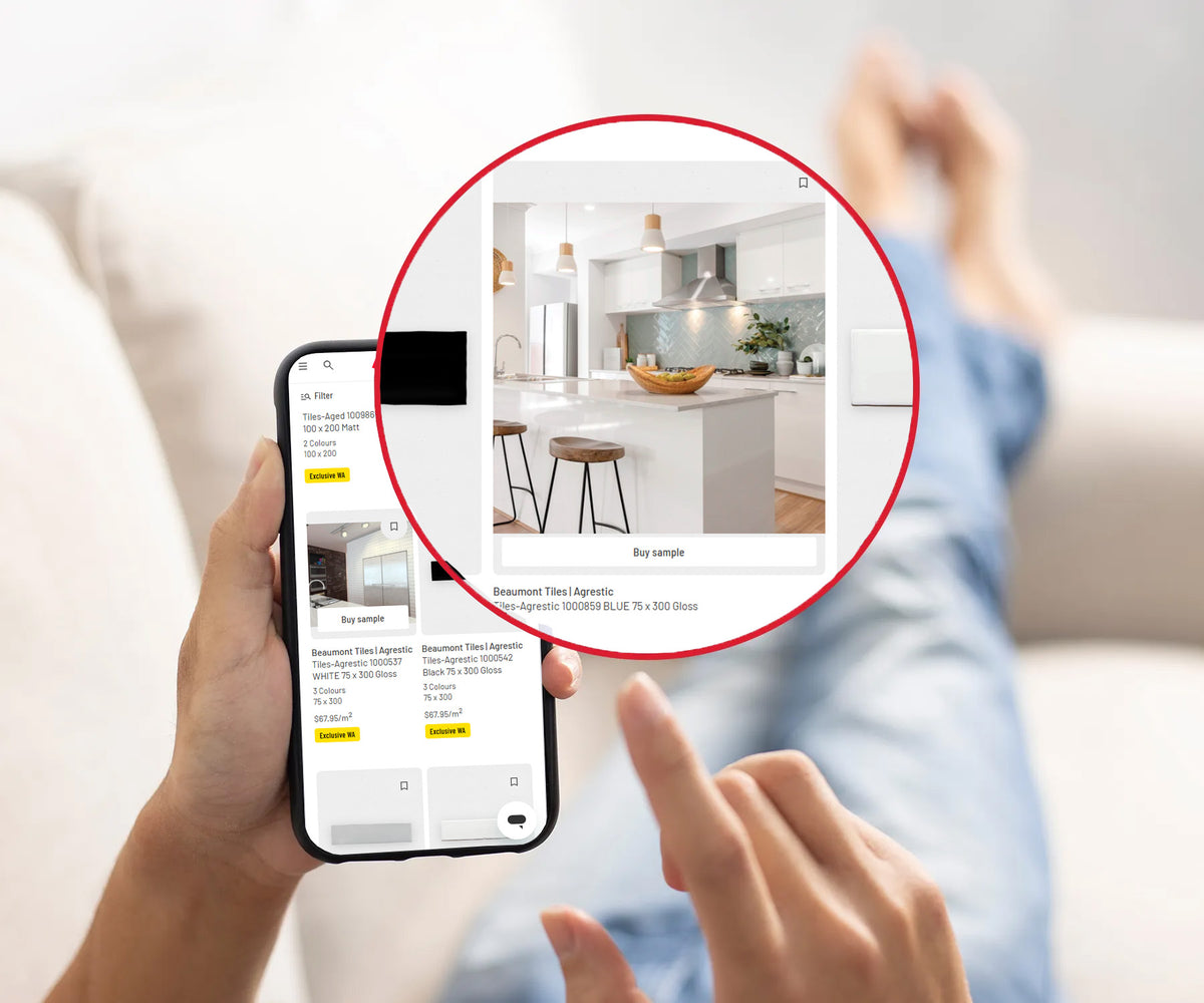 Person demonstrating how to order samples using a smartphone from Beaumont Tiles’ 