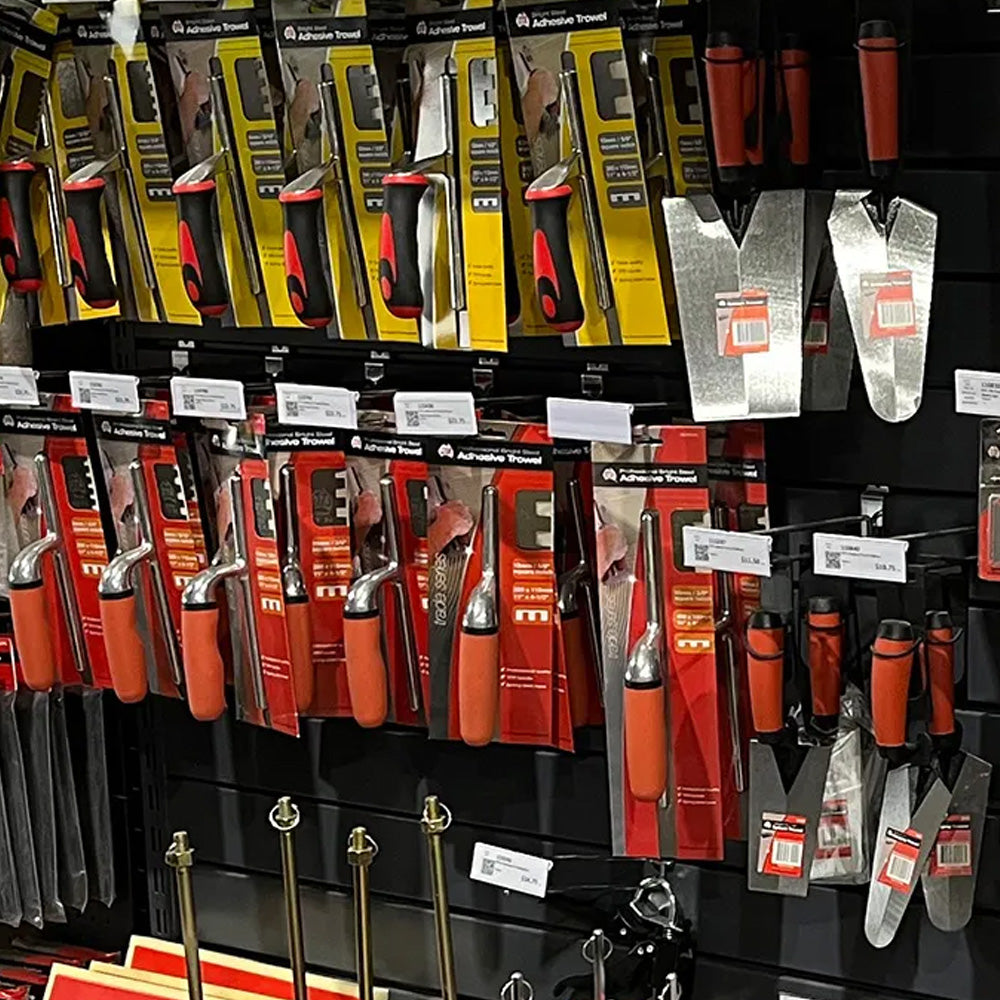 Professional tiling tools including adhesive trowels, margin trowels and tile finishing tools for DIY and trade tile installation.