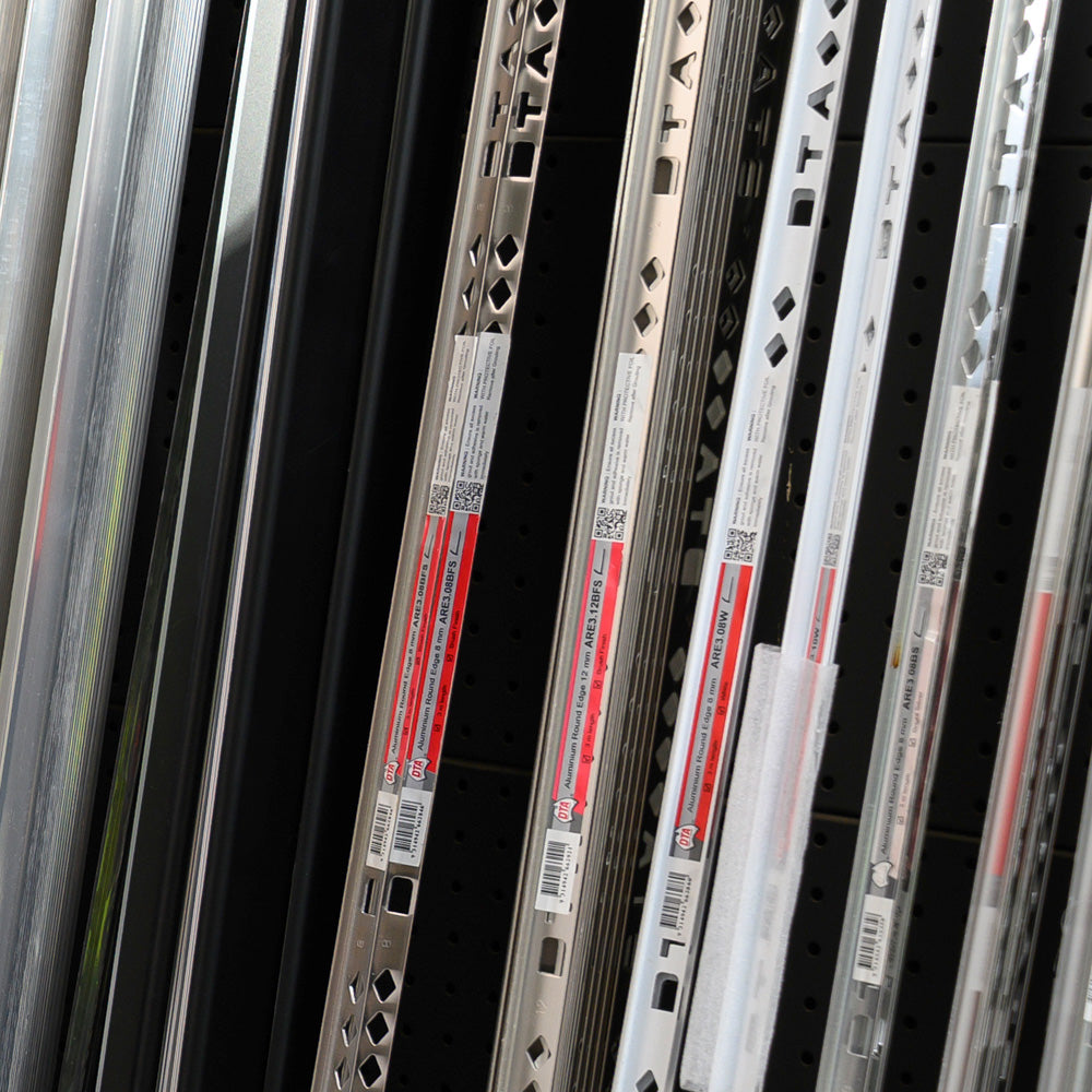 Aluminium tile trims and edging profiles for finishing tile edges, corners and transitions in tiling projects.